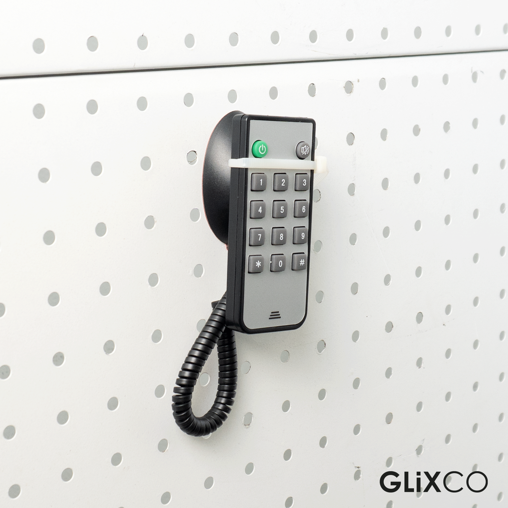 Cable Retráctil Imantado para Control Remoto / Soporte Magnético Antipérdida / Fijación en pared / Largo Max 80cm