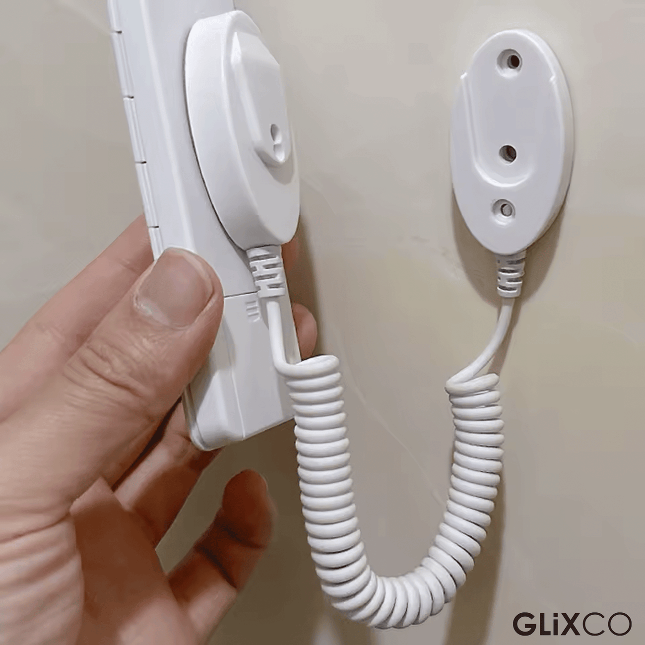Cable Retráctil Imantado para Control Remoto / Soporte Magnético Antipérdida / Fijación en pared / Largo Max 80cm
