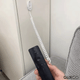 Cable Retráctil Imantado para Control Remoto / Soporte Magnético Antipérdida / Fijación en pared / Largo Max 80cm